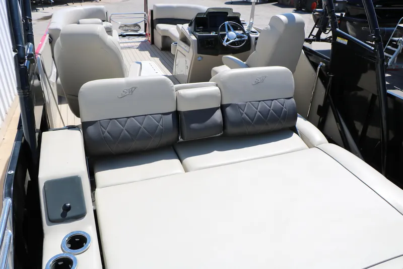 Slide: The Image of 2021 Silver Wave 2410 SW5 JS boat interior with luxurious seating and modern dashboard. - 24