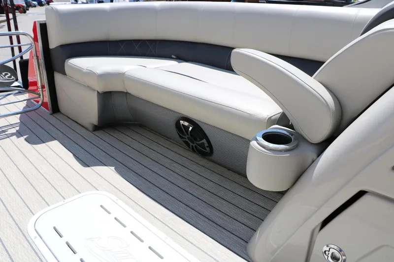 Slide: The Image of Interior of 2021 Silver Wave 2410 SW5 JS boat with cushioned seating and cup holder. - 34