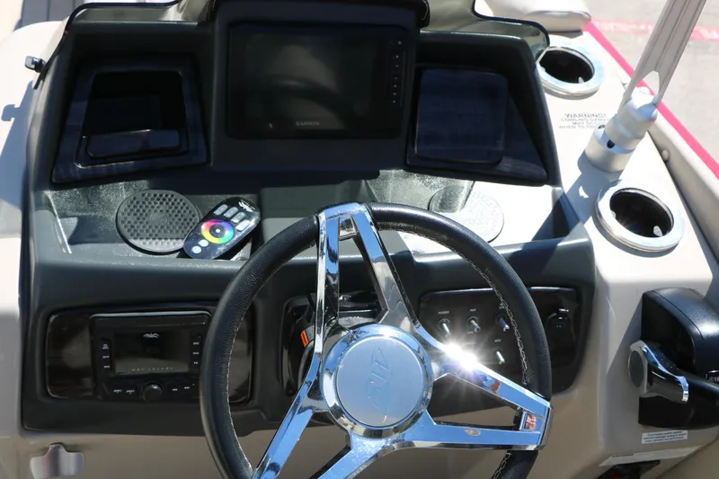 Slide: The Image of Steering console of 2021 Silver Wave 2410 SW5 JS boat with modern controls and display. - 40