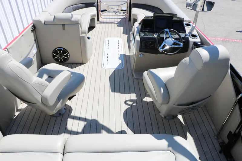 Slide: The Image of 2021 Silver Wave 2410 SW5 JS boat interior with plush seating and modern helm. - 44