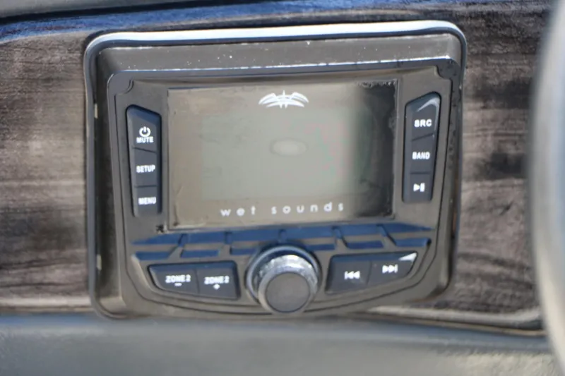 Slide: The Image of Control panel of a 2021 Silver Wave 2410 SW5 JS boat featuring Wet Sounds audio system. - 51
