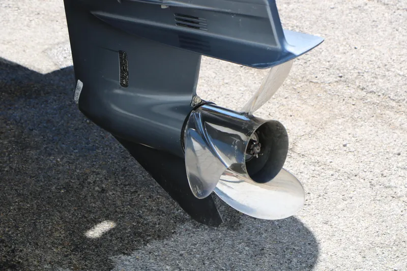 Slide: The Image of Close-up of a 2021 Silver Wave 2410 SW5 JS boat propeller on pavement. - 7