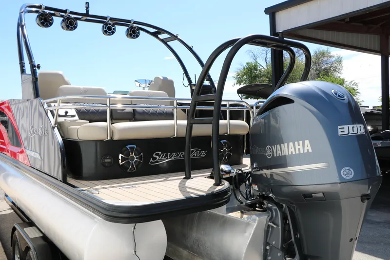 Slide: The Image of 2021 Silver Wave 2410 SW5 JS pontoon boat with Yamaha 300 engine, docked outdoors. - 8