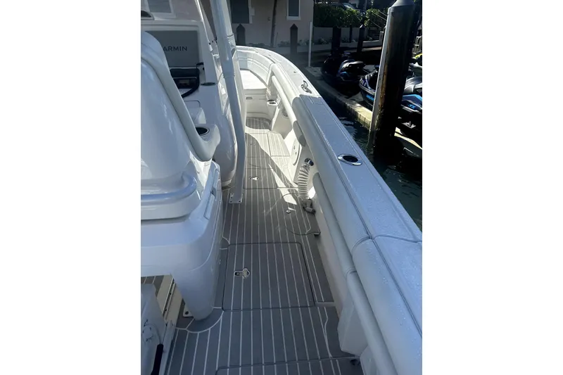 Slide: The Image of 2020 Intrepid 327 Center Console boat deck with sleek design and modern features. - 9