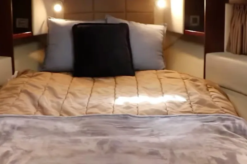 Slide: The Image of Luxurious bedroom interior of 2007 Sea Ray 36 Sedan Bridge yacht. - 23