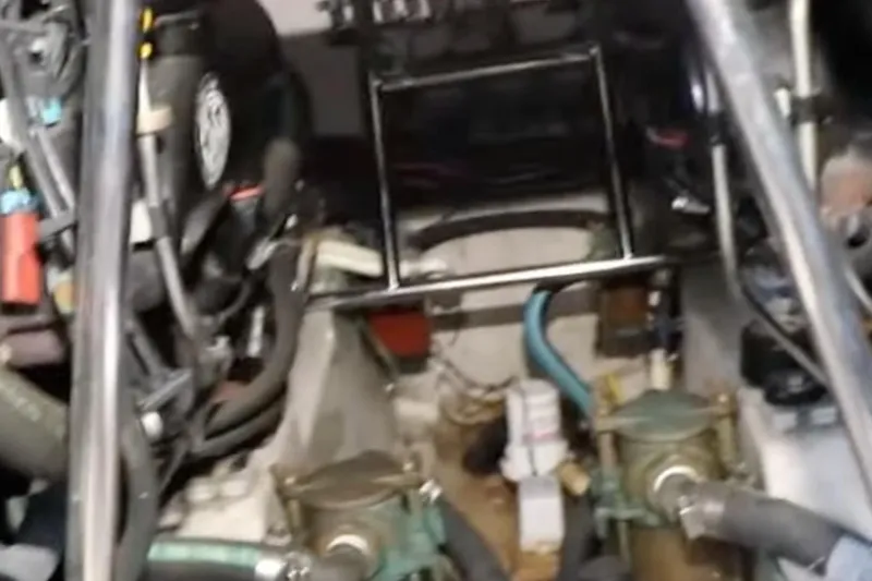 Slide: The Image of Engine compartment of a 2007 Sea Ray 36 Sedan Bridge boat, showcasing mechanical components. - 26