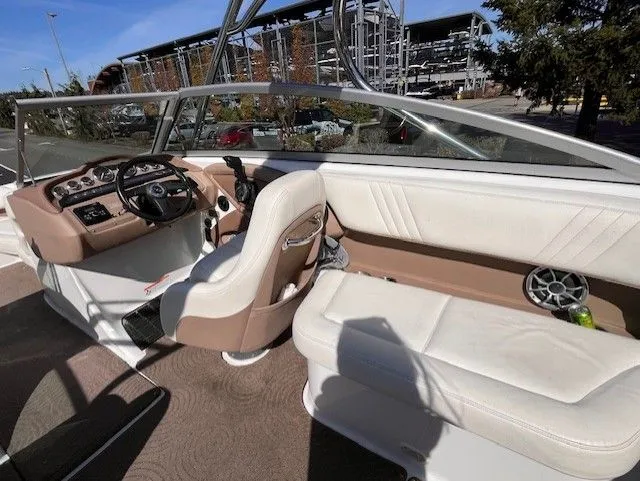 Slide: The Image of Interior of a 2007 Cobalt 252 boat with beige and white seating. - 3