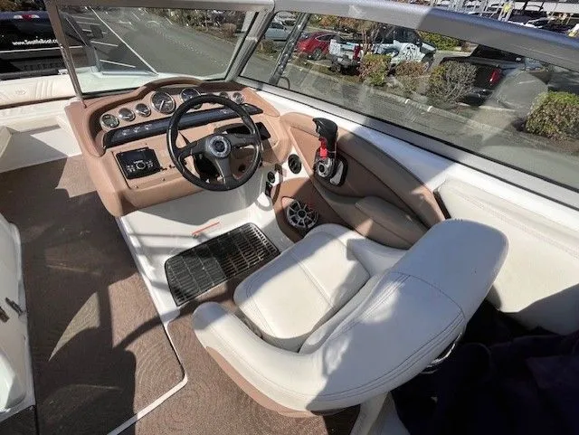 Slide: The Image of Interior of a 2007 Cobalt 252 boat with steering console. - 4