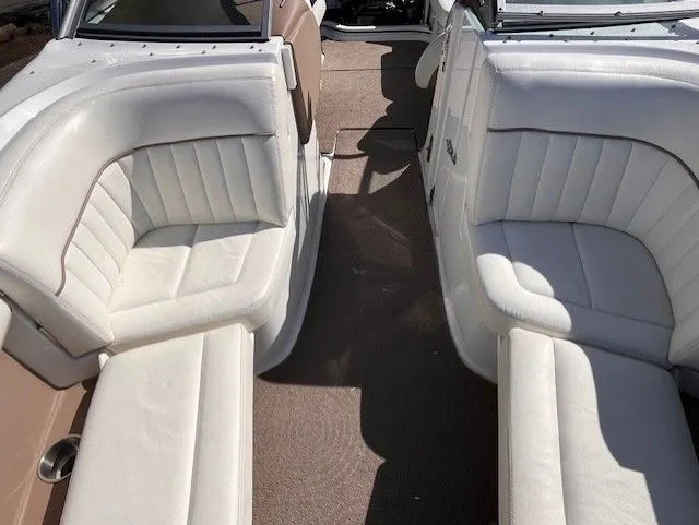Slide: The Image of Interior of a 2007 Cobalt 252 boat with white leather seats. - 6