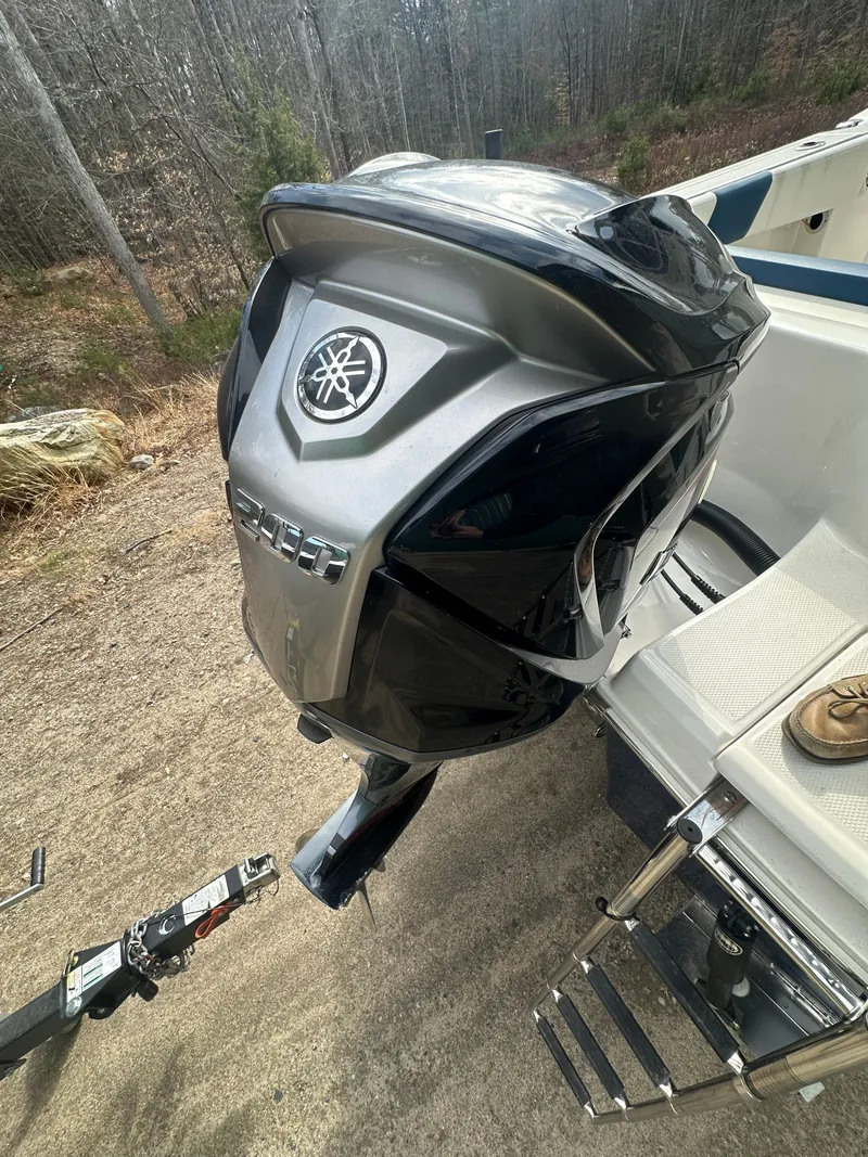Slide: The Image of Yamaha outboard motor on a 2023 Robalo R202 Explorer boat. - 12