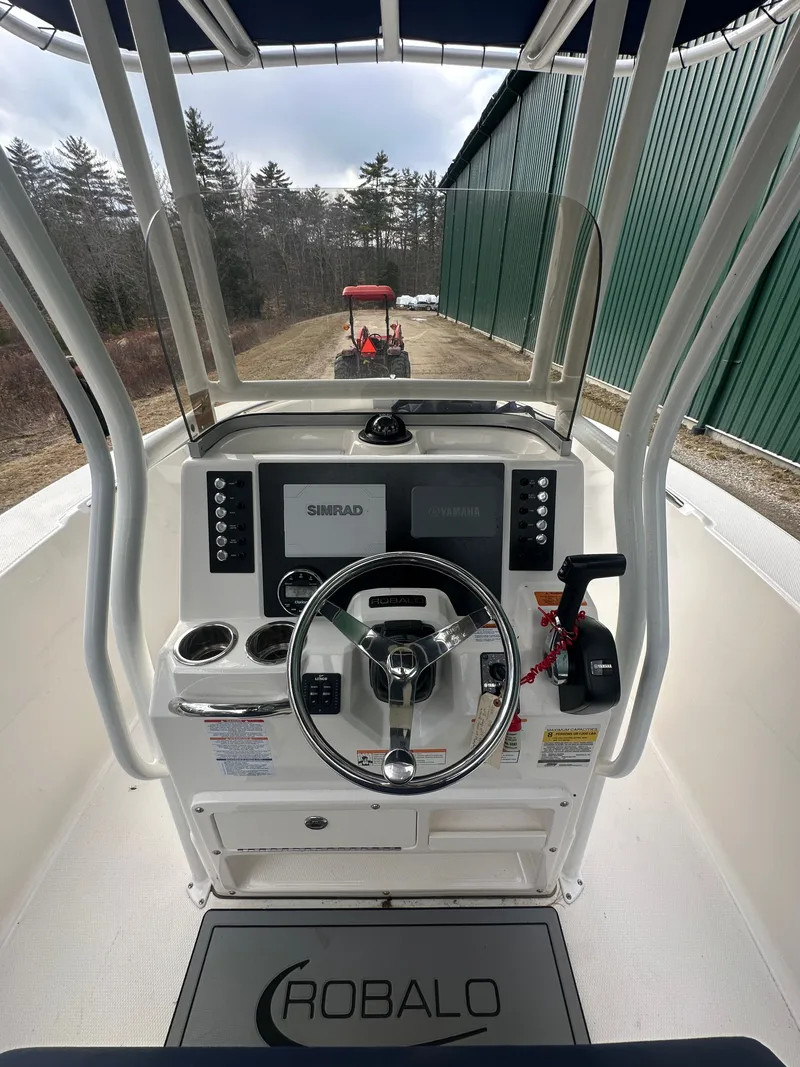 Slide: The Image of Interior view of 2023 Robalo R202 Explorer boat cockpit. - 6
