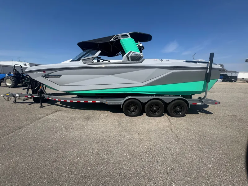 Slide: The Image of 2021 Nautique Super Air G25 Paragon on trailer, side view. - 4
