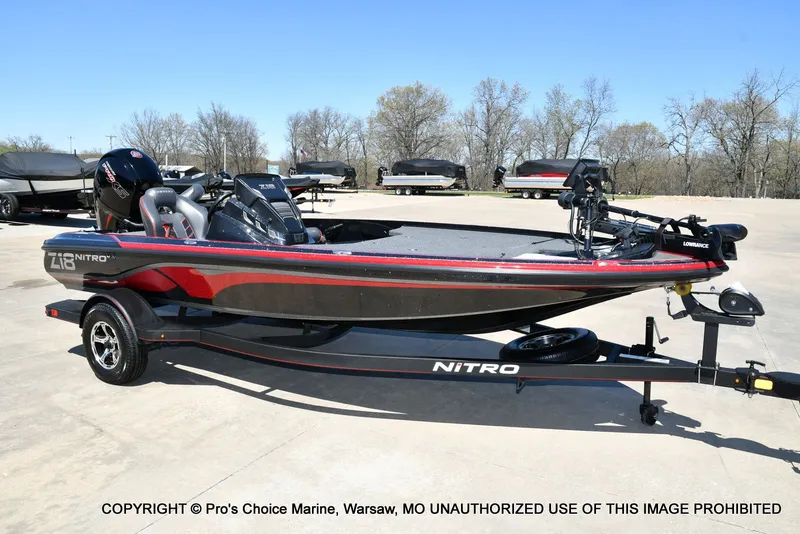 The Image of 2023 Nitro Z18 Pro boat with 150 Pro-XS engine on trailer. - 1