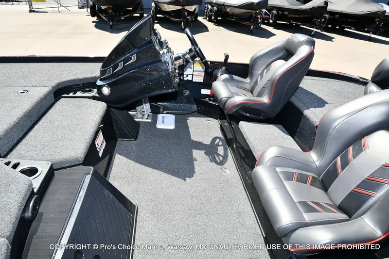 Slide: The Image of Interior of 2023 Nitro Z18 Pro boat with gray and red seats. - 17