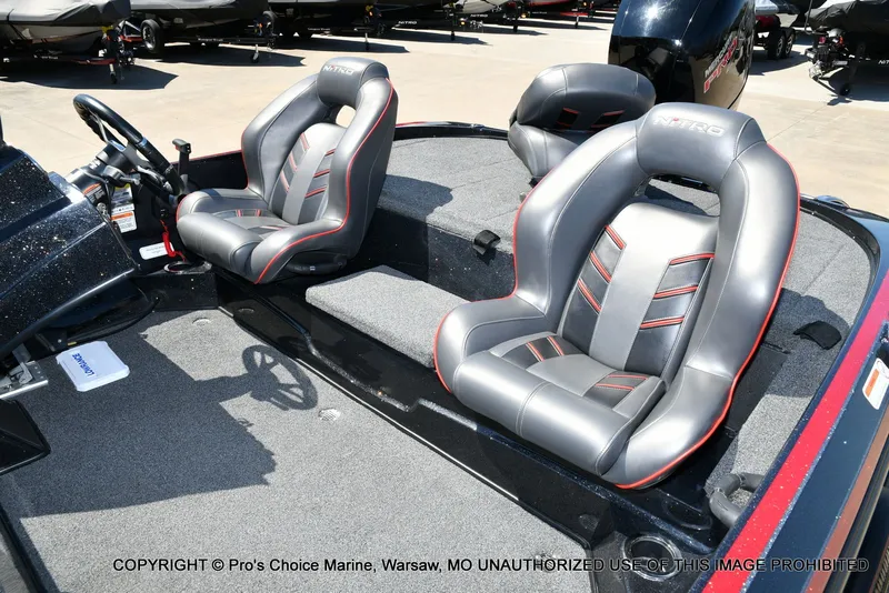 Slide: The Image of Interior of 2023 Nitro Z18 Pro boat with gray leather seats. - 18