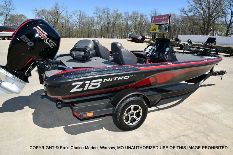 Slide: The Image of 2023 Nitro Z18 Pro boat with 150 Pro-XS engine on trailer. - 22