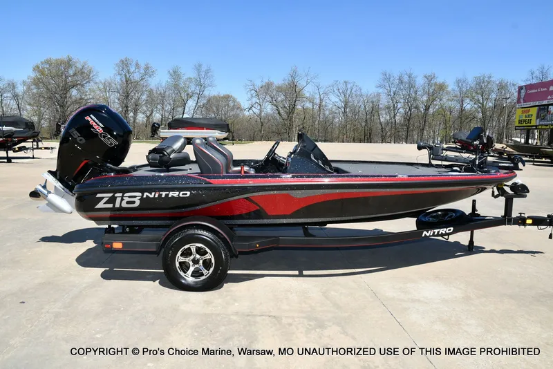 Slide: The Image of 2023 Nitro Z18 Pro boat with 150 Pro-XS engine on trailer. - 23