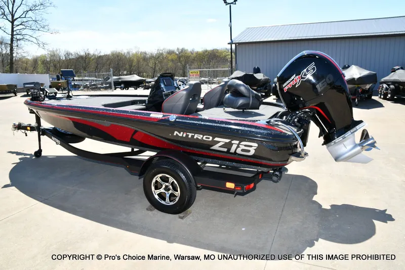 Slide: The Image of 2023 Nitro Z18 Pro boat with 150 Pro-XS engine on trailer. - 29