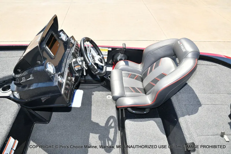 Slide: The Image of Interior of 2023 Nitro Z18 Pro boat with steering console and seat. - 47