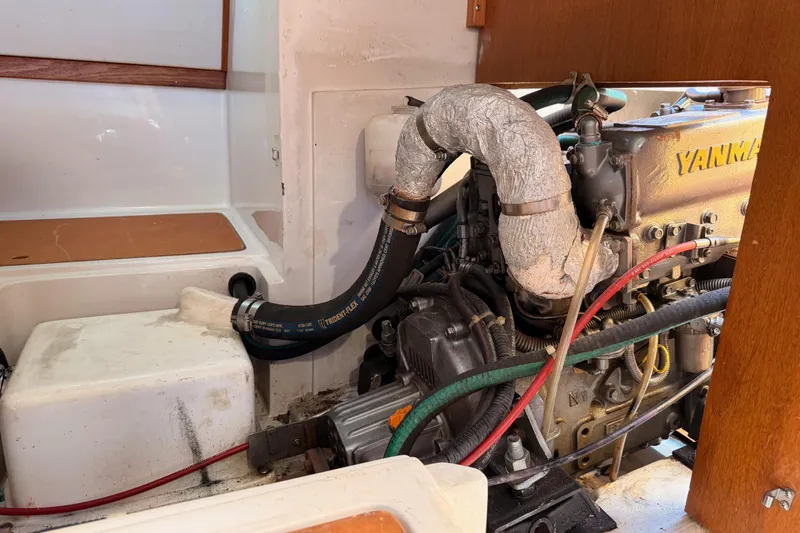Slide: The Image of Engine compartment of a 1999 Catalina 320 sailboat with Yanmar engine. - 51