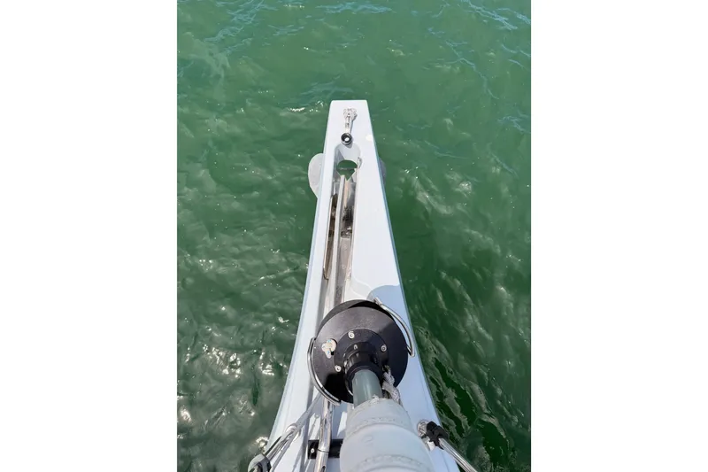 Slide: The Image of Bow view of 2020 Beneteau Oceanis 51.1 sailboat on calm green water. - 19