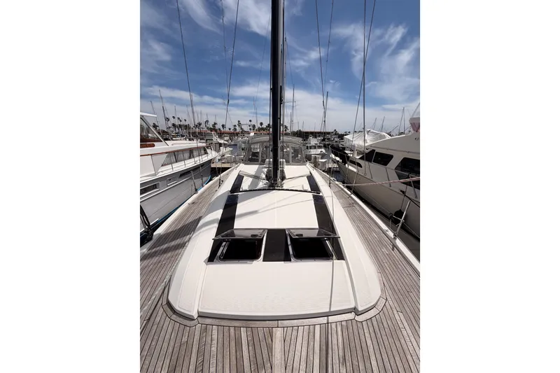 Slide: The Image of 2020 Beneteau Oceanis 51.1 yacht deck with clear sky and marina view. - 21