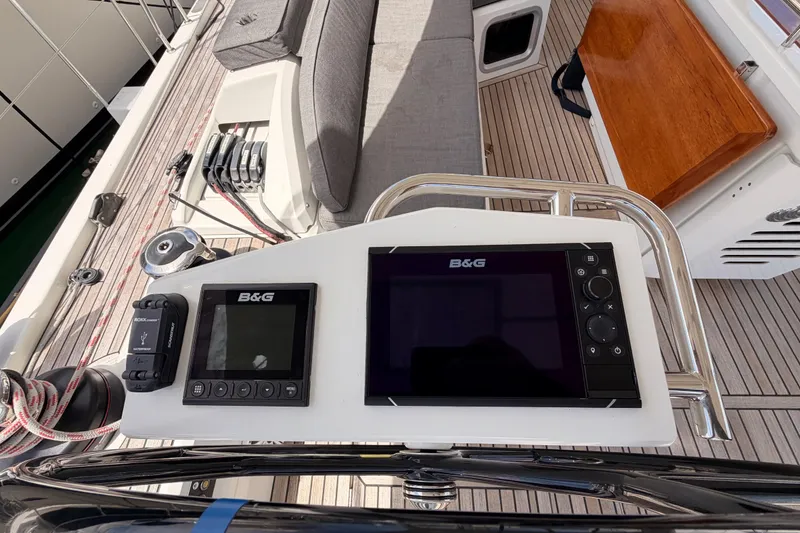 Slide: The Image of Cockpit of 2020 Beneteau Oceanis 51.1 with B&G navigation equipment and teak decking. - 33