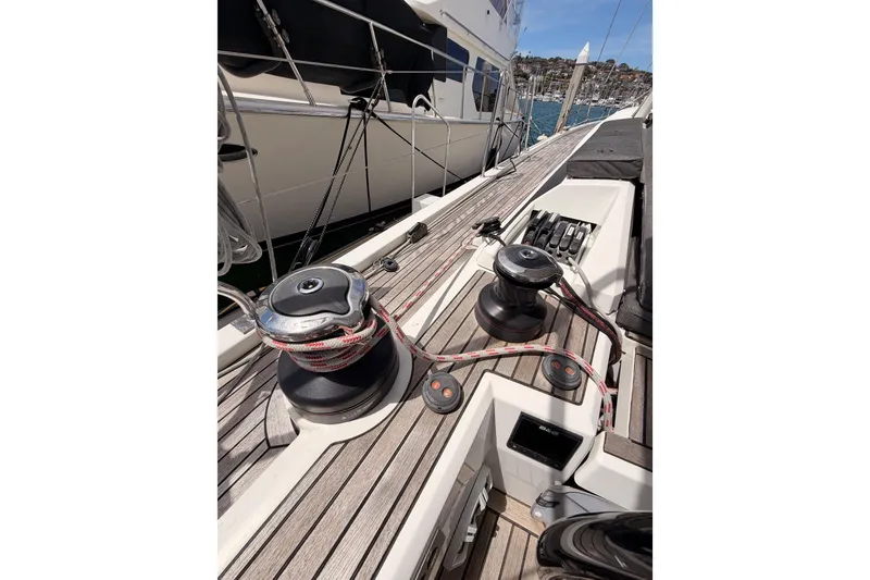 Slide: The Image of Deck view of 2020 Beneteau Oceanis 51.1 sailboat with winches and ropes. - 34