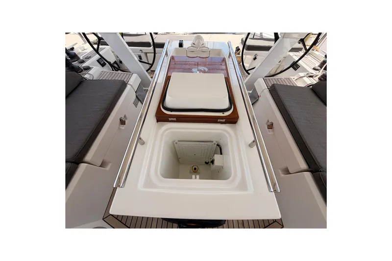 Slide: The Image of Cockpit view of 2020 Beneteau Oceanis 51.1 yacht, featuring seating and storage compartments. - 42