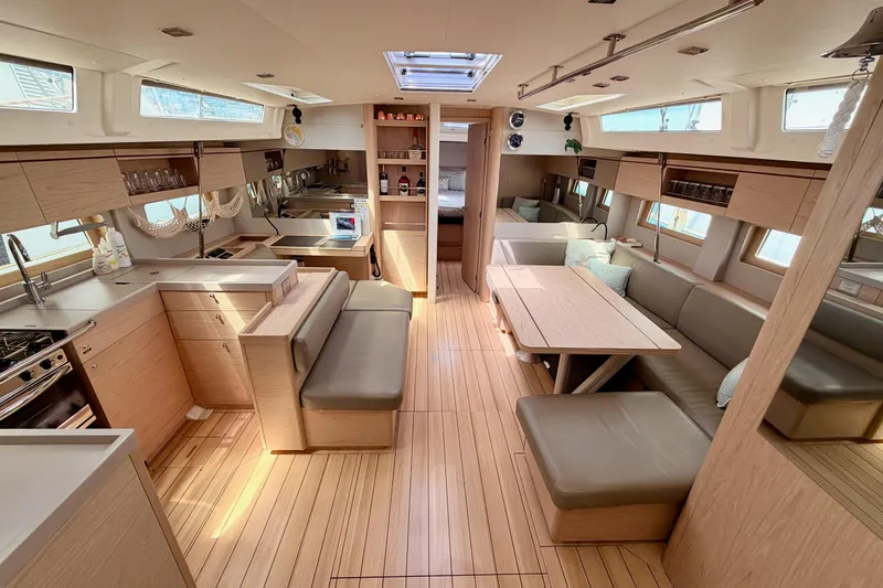 Slide: The Image of Luxurious interior of 2020 Beneteau Oceanis 51.1 yacht with modern kitchen and seating area. - 45