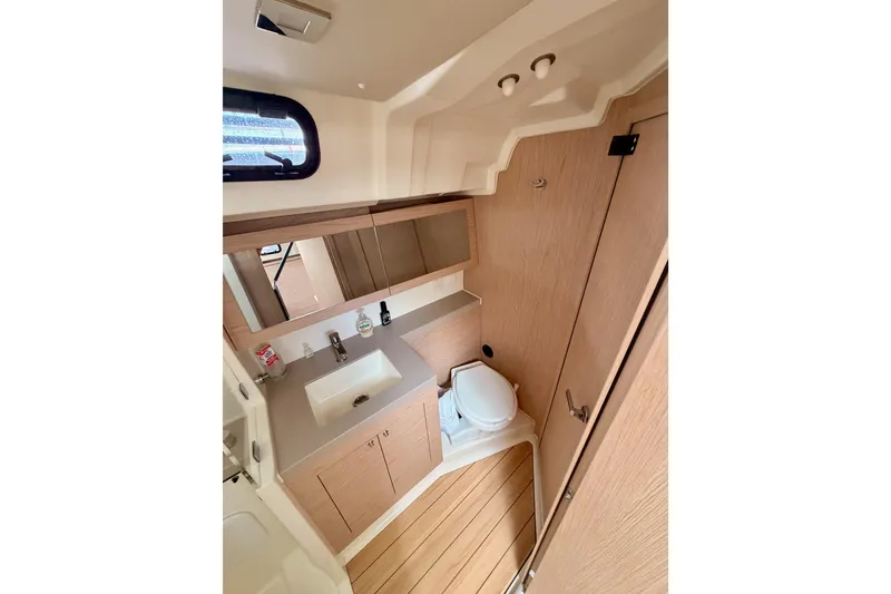 Slide: The Image of Modern bathroom interior of 2020 Beneteau Oceanis 51.1 yacht with wood accents. - 57