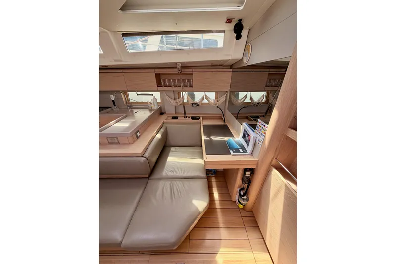 Slide: The Image of Interior of 2020 Beneteau Oceanis 51.1 yacht with modern design and natural lighting. - 66