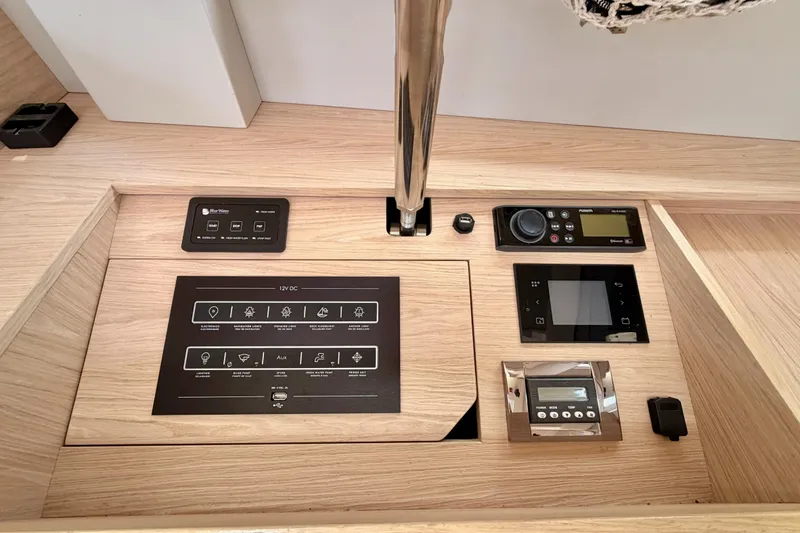 Slide: The Image of Control panel of a 2020 Beneteau Oceanis 51.1 yacht, featuring navigation and system controls. - 68