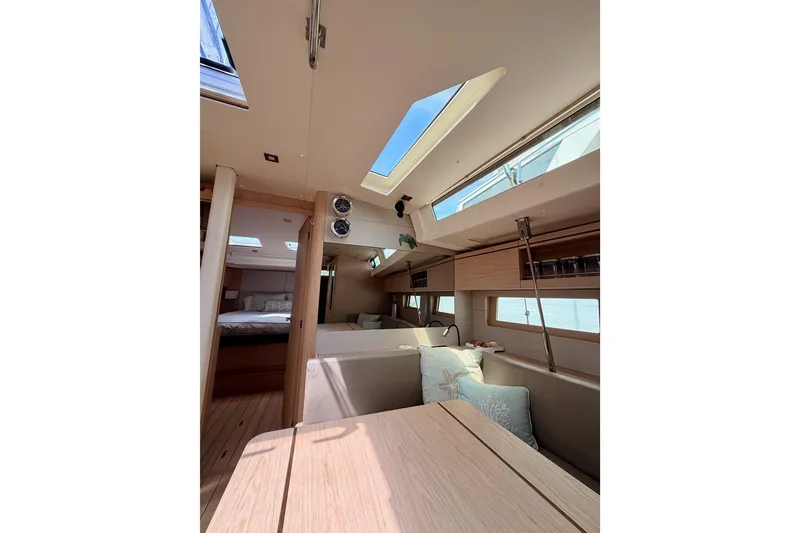 Slide: The Image of Interior of 2020 Beneteau Oceanis 51.1 yacht, featuring modern design and skylights. - 70
