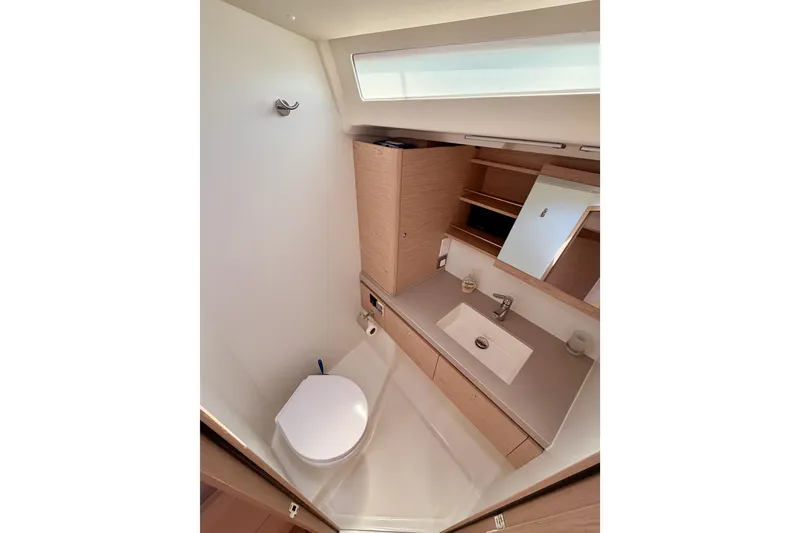 Slide: The Image of Modern bathroom interior on 2020 Beneteau Oceanis 51.1 yacht, featuring sleek design and fixtures. - 75