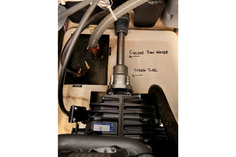 Slide: The Image of Engine compartment of 2020 Beneteau Oceanis 51.1, showing raw water intake and stern tube. - 91