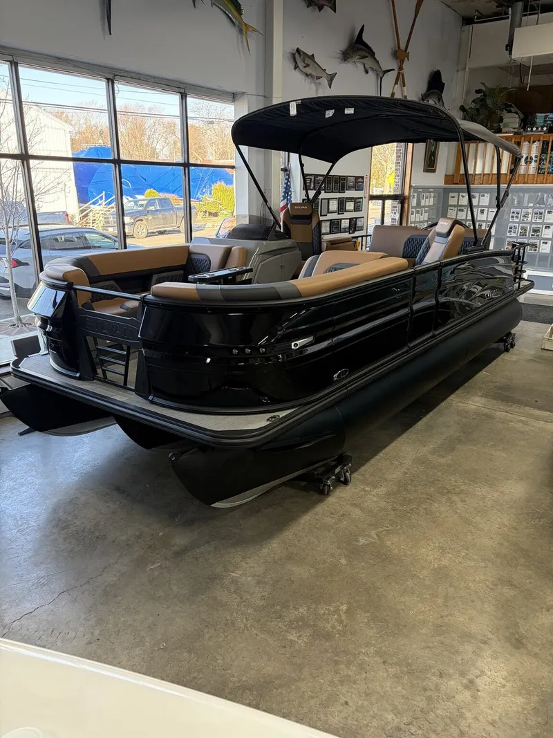 The Image of 2026 Sylvan L Series L-3 ULZ Platinum pontoon boat in showroom. - 1