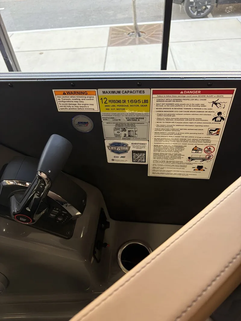 Slide: The Image of Control console of Sylvan L Series L-3 ULZ Platinum 2026 with warning labels. - 10