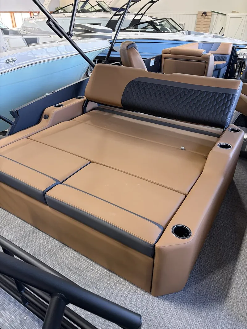 Slide: The Image of Sylvan L Series L-3 ULZ Platinum 2026, luxurious brown boat seating. - 6