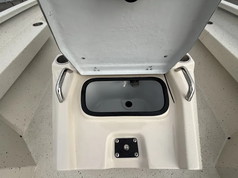 Slide: The Image of Xpress Hyper-Lift Bay Series 2026, open storage compartment lid. - 10