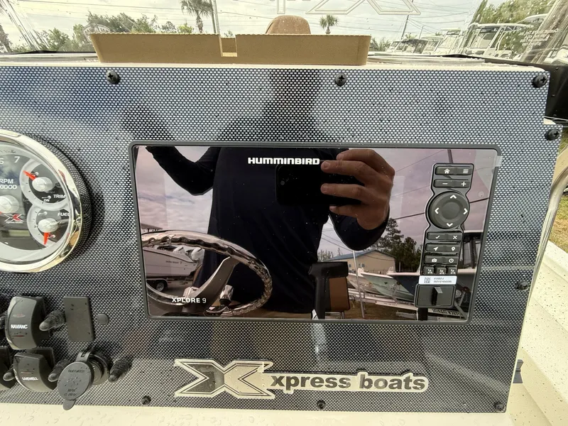 Slide: The Image of Xpress boat console with Humminbird Xplore 9 display, 2026 model. - 14