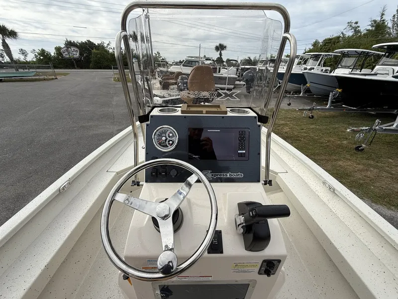 Slide: The Image of Steering console of Xpress Hyper-Lift Bay Series boat, model 2026. - 15