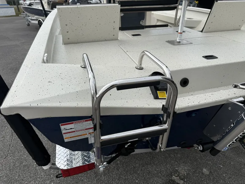 Slide: The Image of 2026 Xpress Hyper-Lift Bay Series boat with ladder and platform. - 4