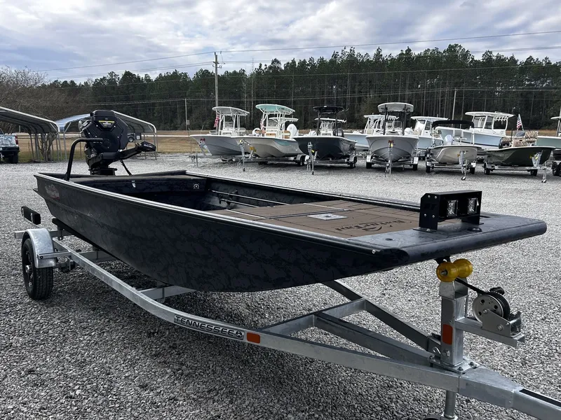 Slide: The Image of 2026 Gator Tail Extreme Series 1754 boat on trailer outdoors. - 3