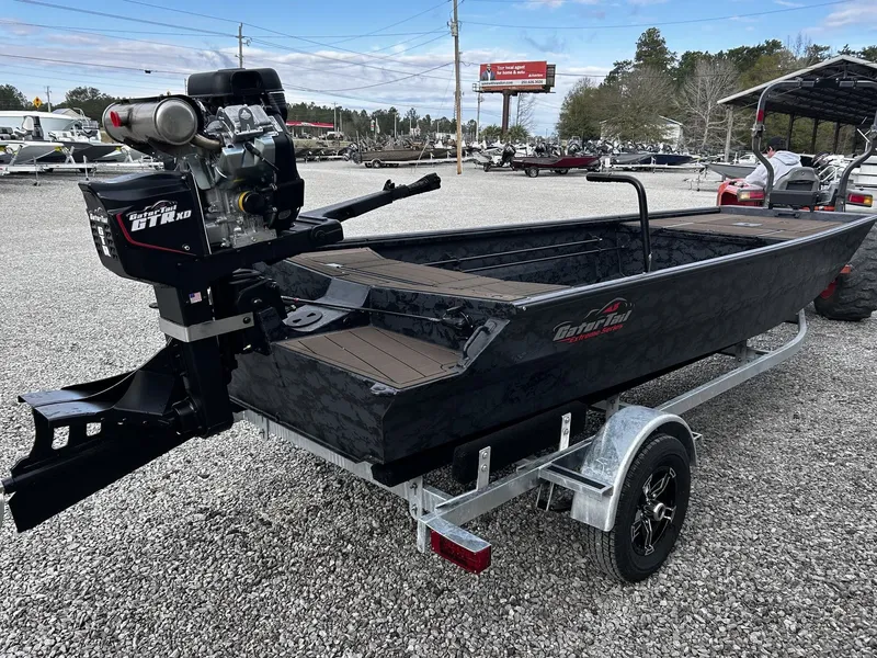 Slide: The Image of 2026 Gator Tail Extreme Series 1754 boat on trailer outdoors. - 4