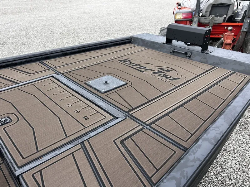 Slide: The Image of Gator Tail Extreme Series 1754 boat deck with ruler, year 2026. - 9