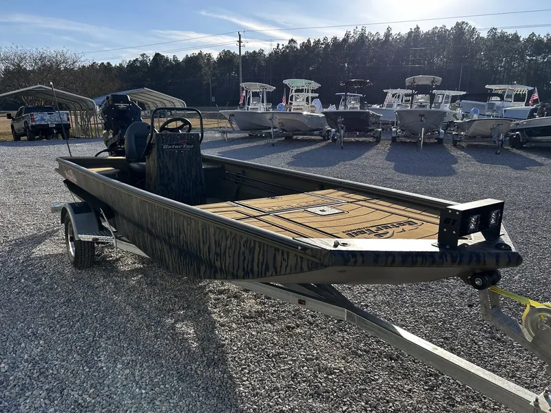 Slide: The Image of 2026 Gator Tail Extreme Series 1860 boat on trailer outdoors. - 7