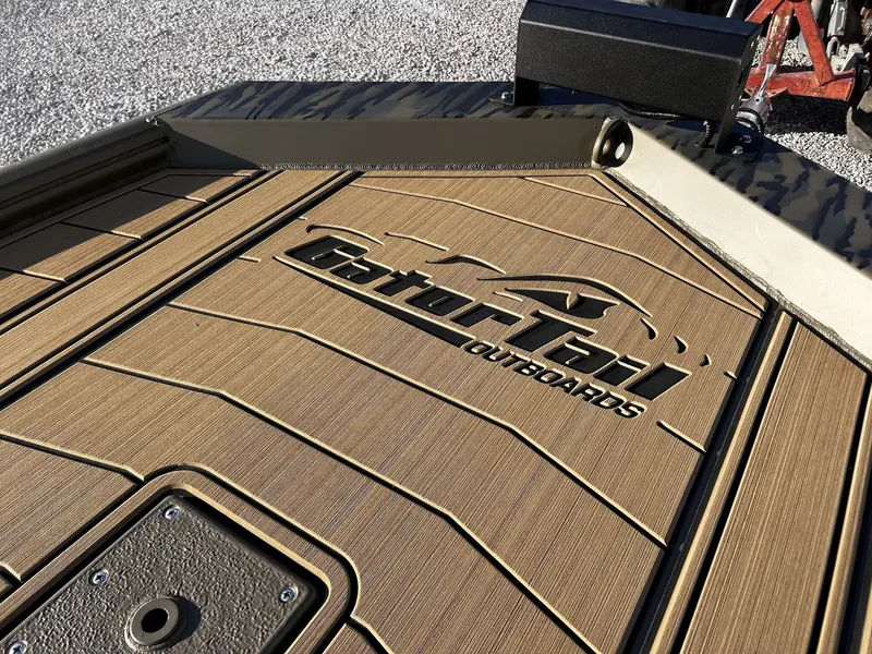 Slide: The Image of Gator Tail Extreme Series 1860 boat deck, 2026 model, close-up. - 9