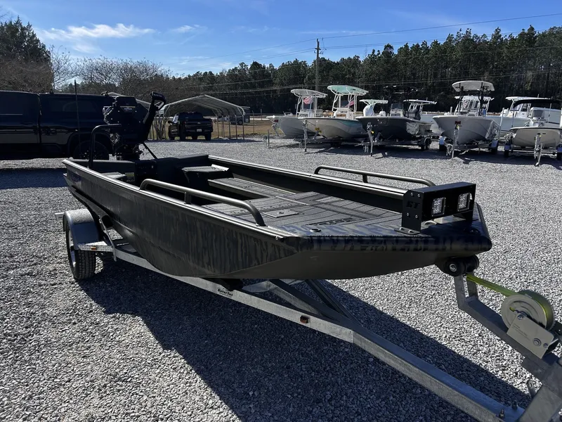 Slide: The Image of 2026 Gator Tail Savage Series 1750 boat on trailer outdoors. - 3