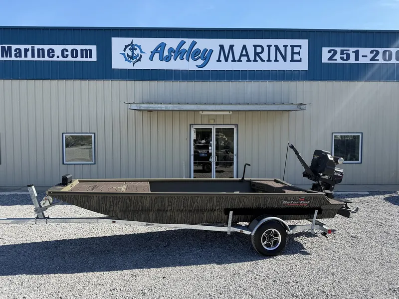 The Image of Gator Tail Extreme Series 1754 boat in front of Ashley Marine building. - 1